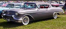 220px-Cadillac_De_Ville_1957_2.jpg