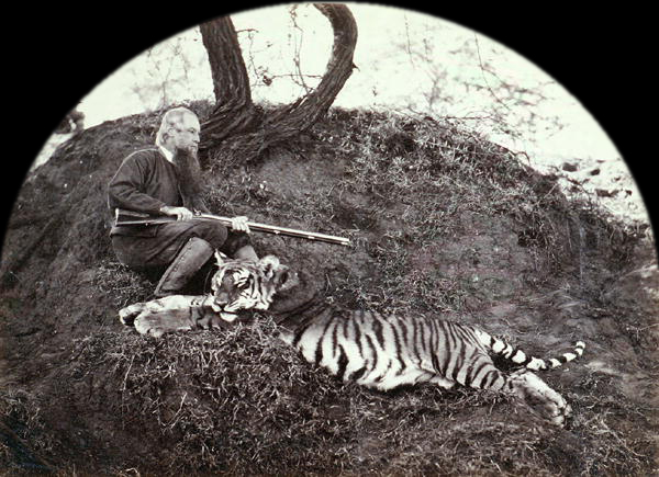 A hunter with a tiger, c.1870.jpg